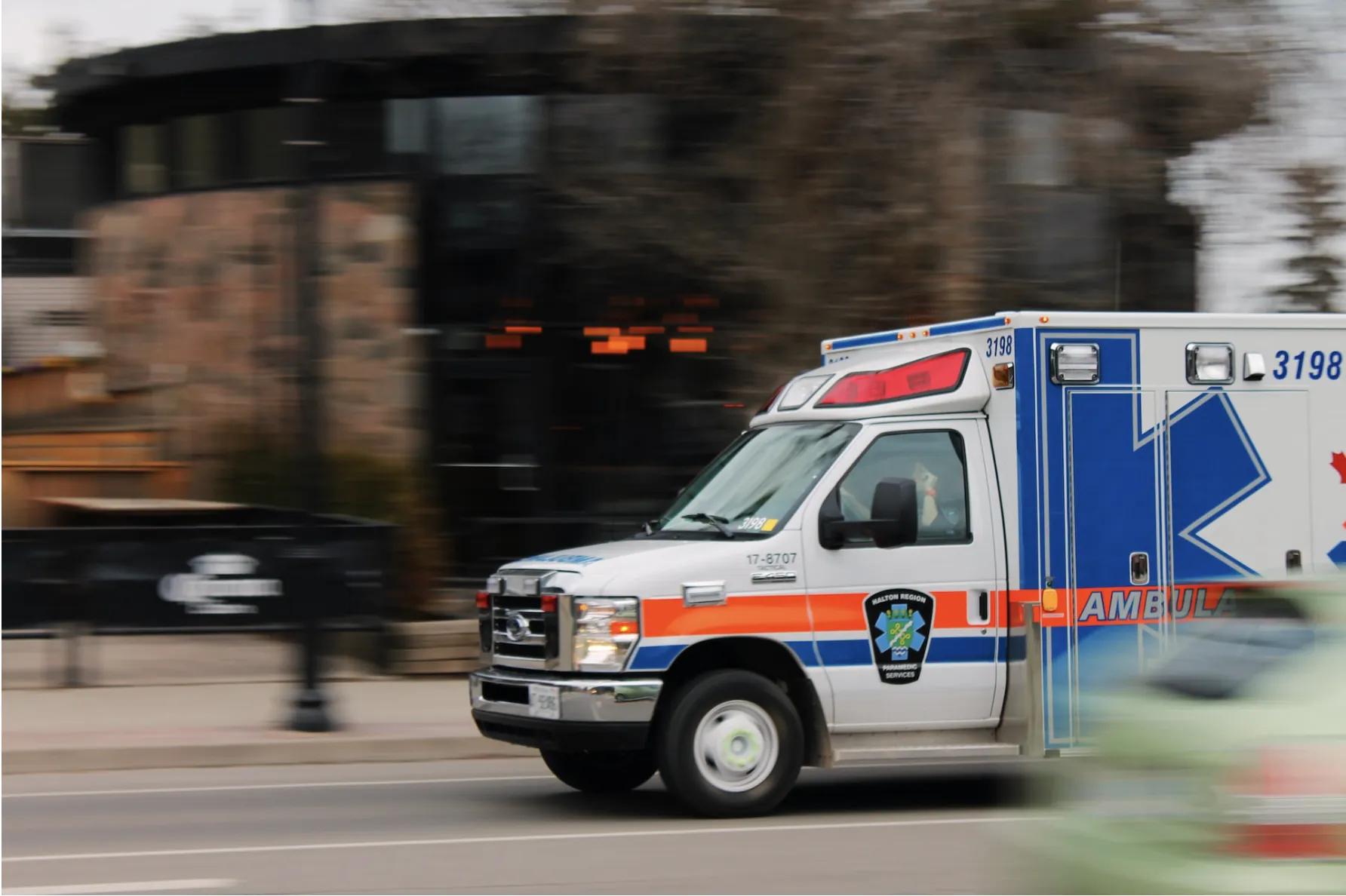 Ambulance responding to a corporate emergency call