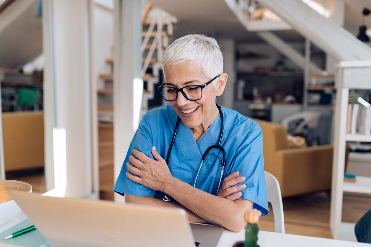 Employee taking an online doctor video consultation at work